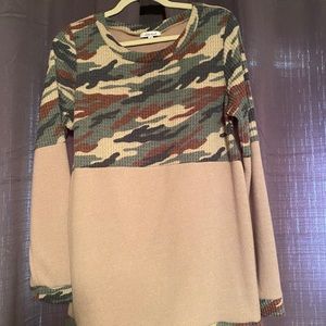 Camo and brown sweater.